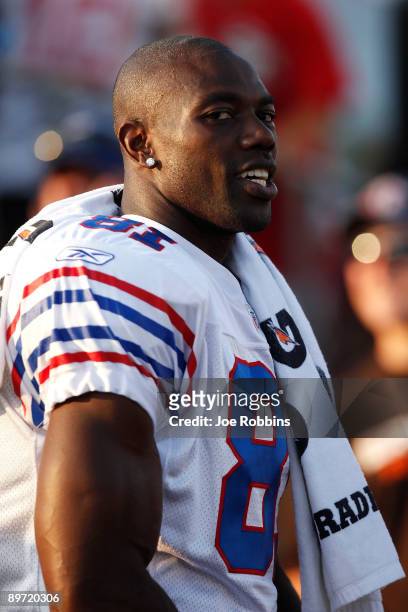 Terrell Owens of the Buffalo Billls looks on against the Tennessee Titans prior to the Pro Football Hall of Fame Game at Fawcett Stadium on August 9,...