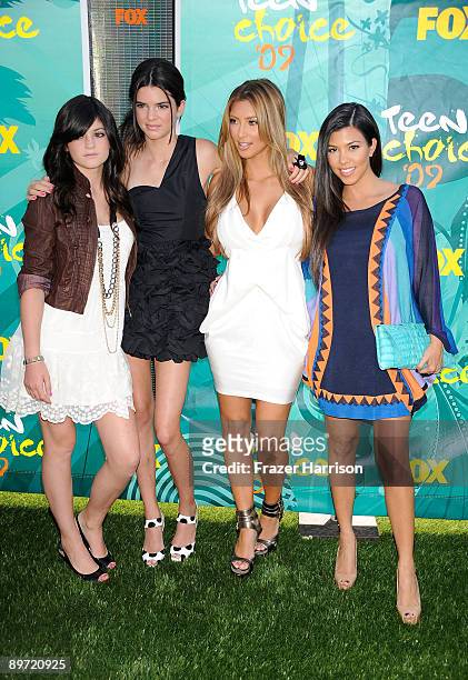Personalities Kylie Jenner, Kendall Jenner, Kim Kardashian and Kourtney Kardashian arrive at the 2009 Teen Choice Awards held at Gibson Amphitheatre...