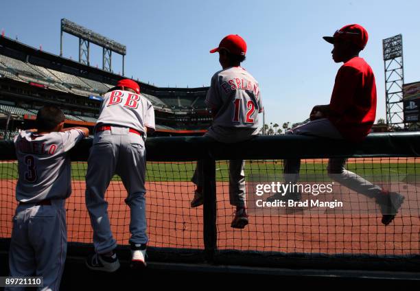 Bat boys of the Cincinnati Reds watch batting practice before the game against the San Francisco Giants at AT&T Park on August 9, 2009 in San...