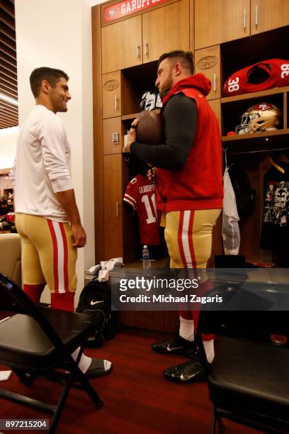 Jimmy Garoppolo and Joe Staley of the San Francisco 49ers talk in the locker room prior to the game against the Tennessee Titans at Levi's Stadium on...
