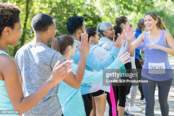 Cheering For Running Racers 781 Crowd Cheering Race Stock Photos, High-Res Pictures, and Images ...