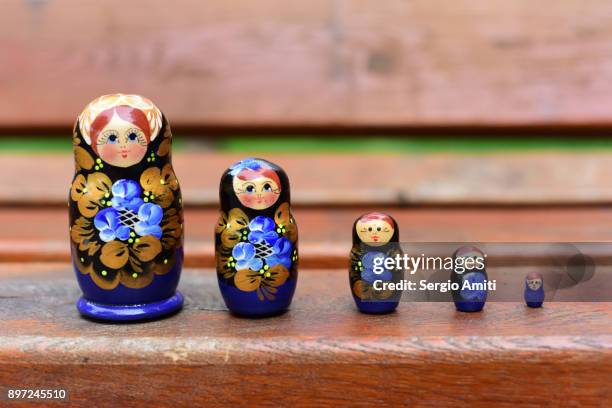 ukrainian matryoshka set in a row - babushka stock pictures, royalty-free photos & images