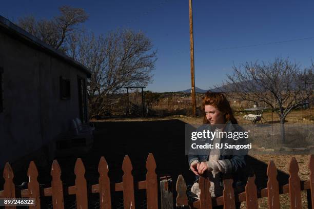 Aubrey Lykins works on chores at home on December 20, 2017 in Walsenburg, Colorado. Lykins grew up in Walsenburg, but moved away to Columbus, Ohio,...