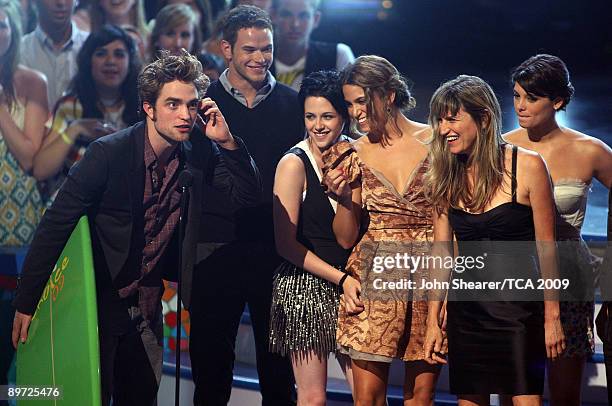 Actors Robert Pattinson, Kellan Lutz, actresses Kristen Stewart, Nikki Reed, director Catherine Hardwicke, and actress Ashley Greene accept an award...