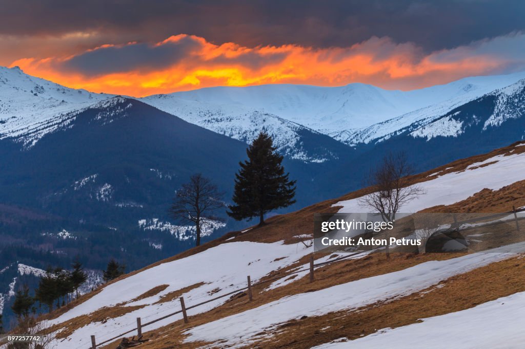 Beautiful sunset in the winter mountains