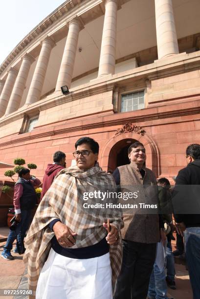 Samajwadi party leaders Prof Ram Gopal with Naresh Aggarwal during the on-going winter session of Parliament house on December 22, 2017 in New Delhi,...