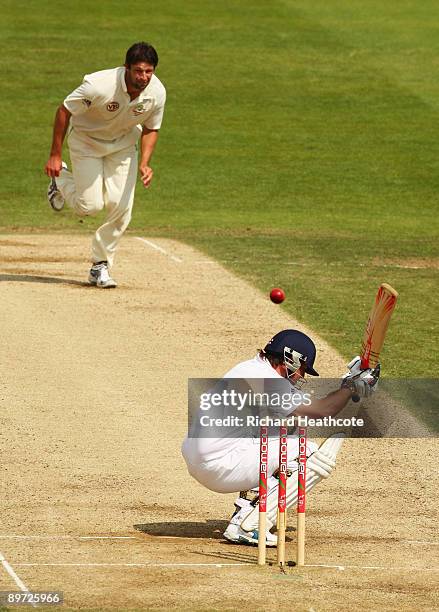 Graeme Swann of England ducks a bouncer from Ben Hilfenhaus of Australia during day three of the npower 4th Ashes Test Match between England and...