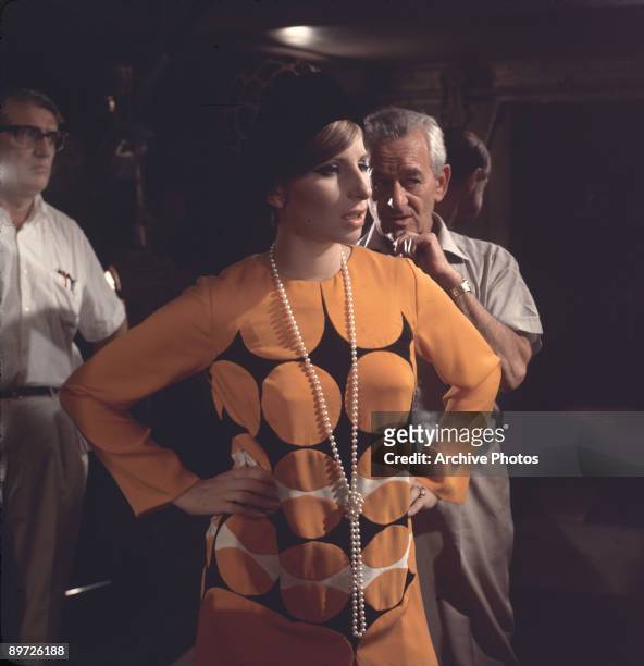 American actress and singer Barbra Streisand on the set of the movie 'Funny Girl' with director William Wyler , 1968.