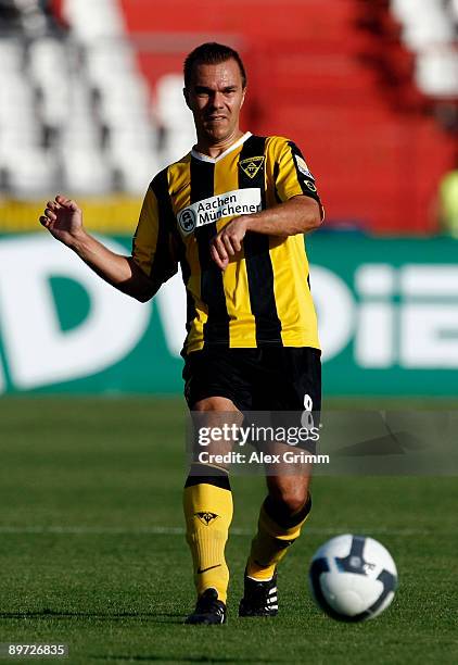 Szilard Nemeth of Aachen passes the ball during the Second Bundesliga match between Karlsruher SC and Alemannia Aachen at the Wildpark Stadium on...