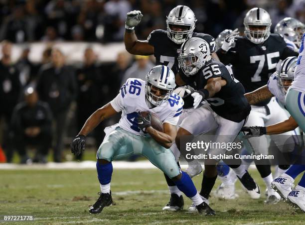 Alfred Morris of the Dallas Cowboys runs the ball against the Oakland Raiders at Oakland-Alameda County Coliseum on December 17, 2017 in Oakland,...