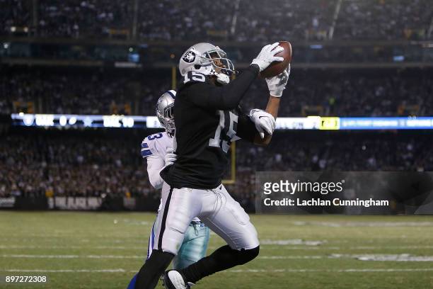 Michael Crabtree of the Oakland Raiders catches a touchdown against Chidobe Awuzie of the Dallas Cowboys at Oakland-Alameda County Coliseum on...