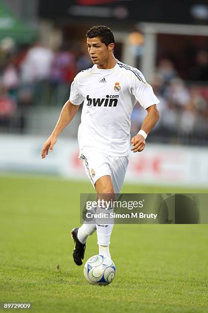 Cristiano Ronaldo of Real Madrid runs with the ball during the pre-season friendly match between Toronto FC and Real Madrid at BMO Field on August 7,...