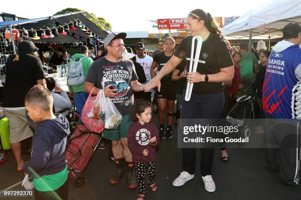 Dame Valerie Adams chats to visitors at Otara Markets with the Queens Baton during the Commonwealth Games Queens Baton Relay Visit to Auckland on...