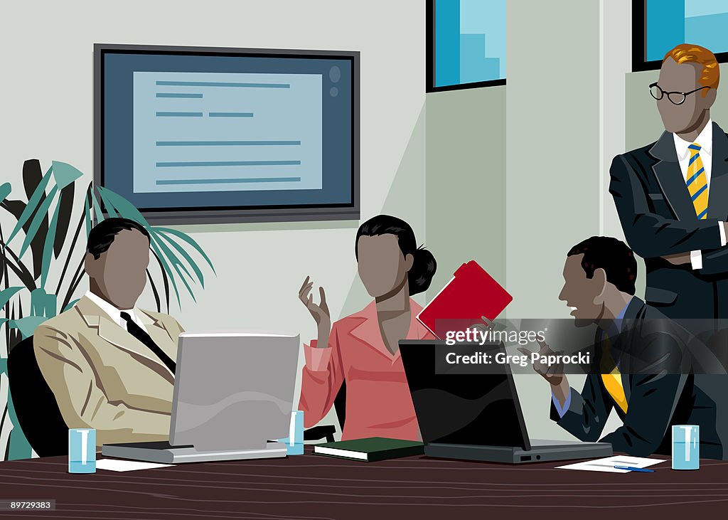 Executives talking in conference room