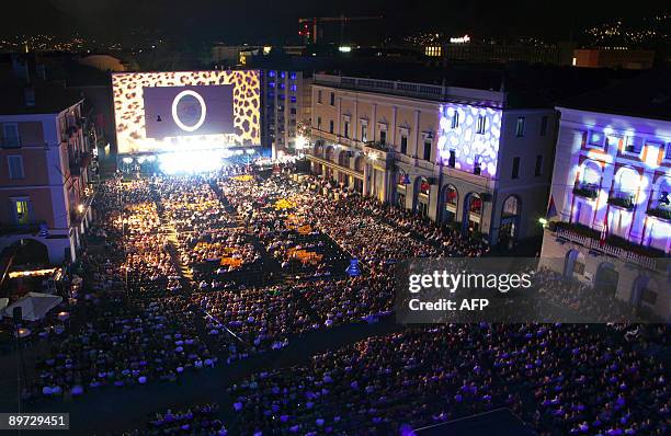 Spectators seated infront of the giant screen at the Piazza Grande during the 62nd Locarno international film festival on late August 9, 2009 in...