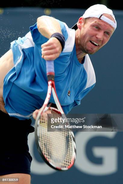 Rainer Schuettler of Germany serves to Florent Serra of France during the Rogers Cup at Uniprix Stadium August 10, 2009 in Montreal, Quebec, Canada.