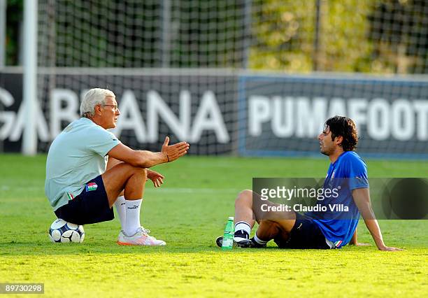 Coach Marcello Lippi and Vincenzo Iaquinta of Italy during the training on August 10, 2009 in Coverciano , Italy.