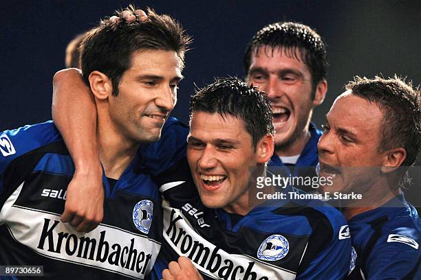 Andre Mijatovic, Giovanni Federico, Pavel Fort and Arne Feick of Bielefeld celebrate their third goal during the second Bundesliga match between...