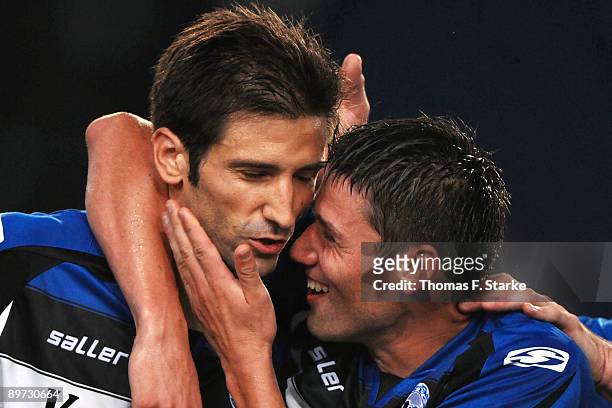 Andre Mijatovic and Giovanni Federico of Bielefeld celebrate their third goal during the second Bundesliga match between Arminia Bielefeld and Hansa...