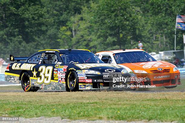 Ryan Newman, driver of the US Army Chevrolet, and Joey Logano, driver of the Home Depot Toyota, drive during the NASCAR Sprint Cup Series Heluva...