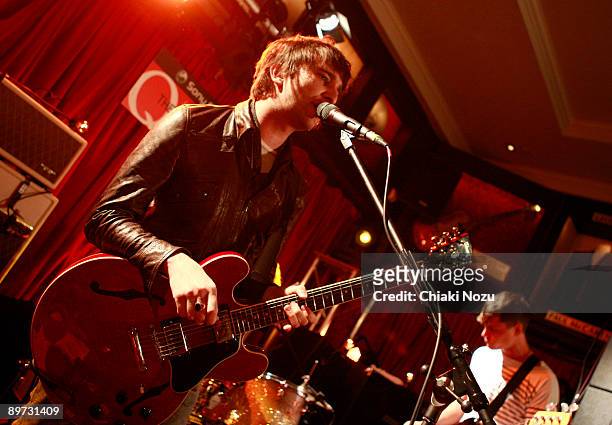 Nic Cester and Mark Wilson of Jet perform at Hard Rock Cafe London on August 10, 2009 in London, England.