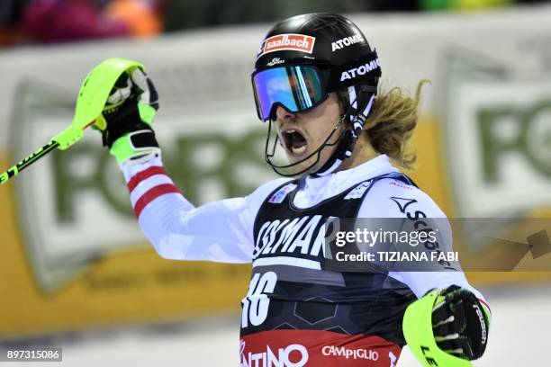 Austria's Manuel Feller reacts after the second run of the FIS Alpine World Cup Men's Slalom on December 22, 2017 in Madonna di Campiglio, Italian...