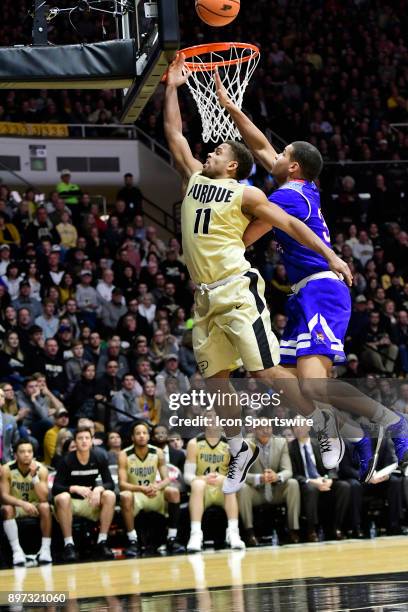 Thompson guard Purdue University Boilermakers misses this lay-up attempt against Jalen Duke guard Tennessee State University Tigers, Thursday,...