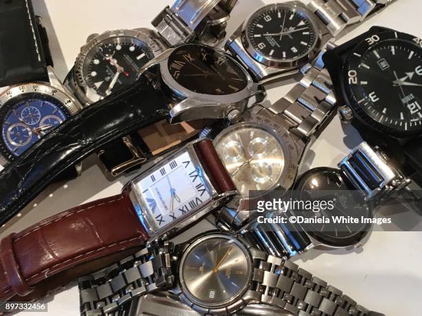a heap of time keepers - luxury watches stock pictures, royalty-free photos & images