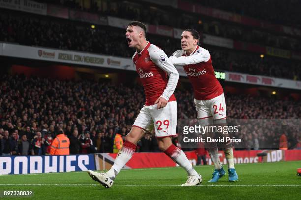 Granit Xhaka celebrates scoring Arsenal's 2nd goal with Hector Bellerin during the Premier League match between Arsenal and Liverpool at Emirates...