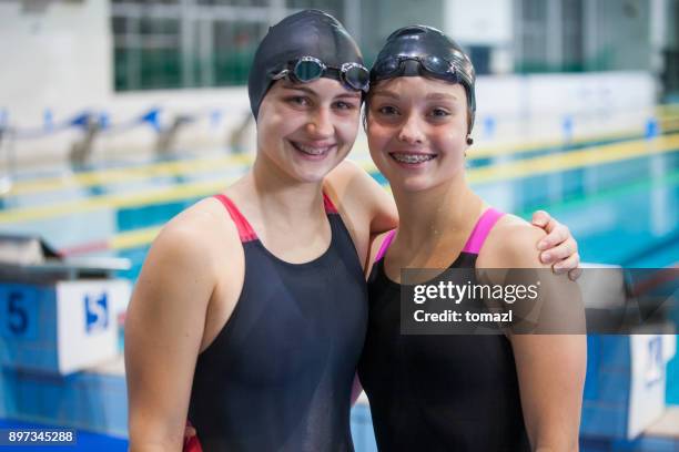 young female swimmers portrait - swim meet stock pictures, royalty-free photos & images