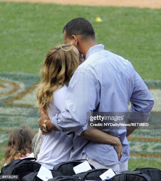 New York Yankees slugger Alex Rodriguez and actress Kate Hudson embrace at Yankees Family Picnic Day July 25, 2009 in New York City.