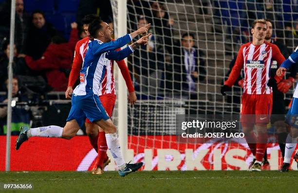 Espanyol's forward Sergio Garcia celebrates his goal during the Spanish league football match RCD Espanyol vs Club Atletico de Madrid at the RCDE...