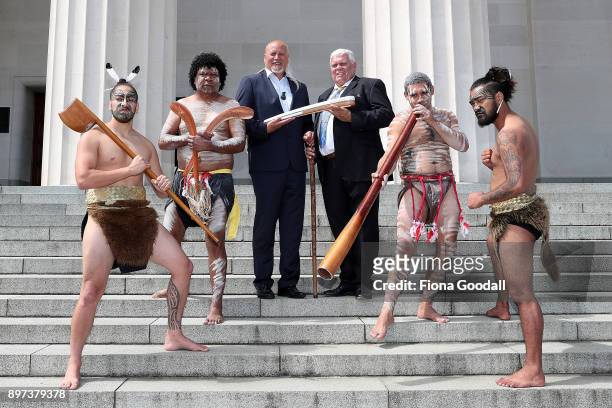 Uncle John Graham of the Yugambeh clan holds the Queens Baton with Taiaha Hawke of Ngati Whatua at Auckland War Memorial Museum during the...