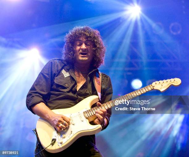 Nico Tamburella of Nico's Alchemy performs on stage playing a scalloped fret Fender Stratocaster on the third day of the Bulldog Bash at Avon Park...