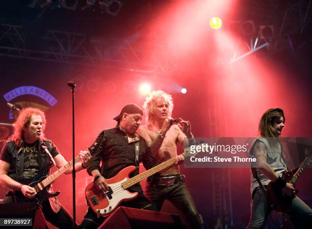 Graham Oliver, Steve Dawson, John Ward and Haydn Conway of Oliver/Dawson Saxon perform on stage on the second day of the Bulldog Bash festival at...
