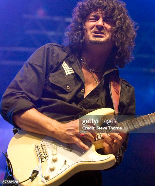 Nico Tamburella of Nico's Alchemy performs on stage playing a scalloped fret Fender Stratocaster on the third day of the Bulldog Bash at Avon Park...