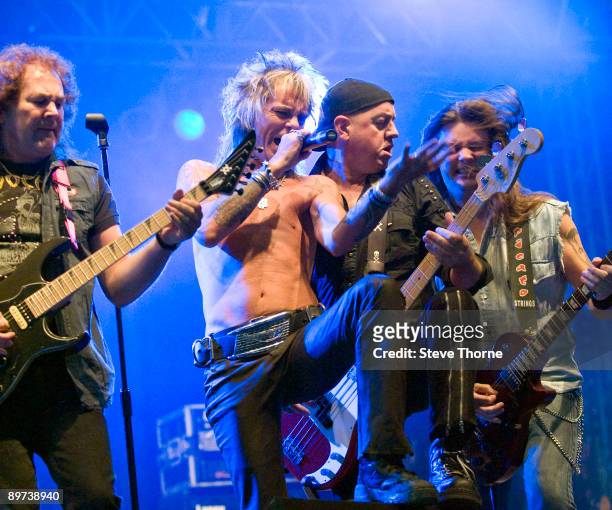 Graham Oliver, John Ward, Steve Dawson and Haydn Conway of Oliver/Dawson Saxon perform on stage on the second day of the Bulldog Bash festival at...