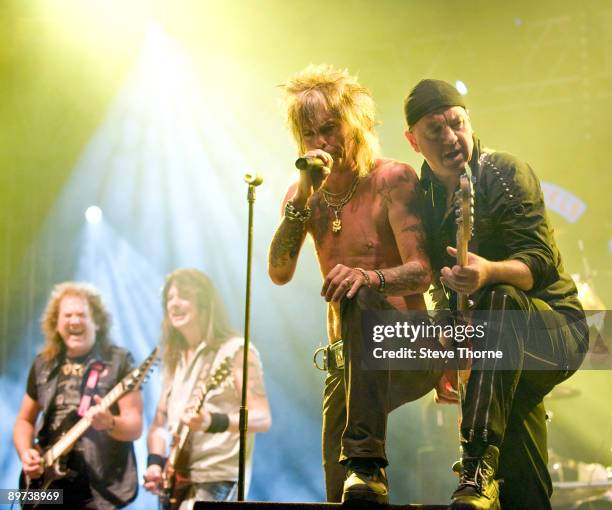 Graham Oliver, Haydn Conway, John Ward and Steve Dawson of Oliver/Dawson Saxon perform on stage on the second day of the Bulldog Bash festival at...