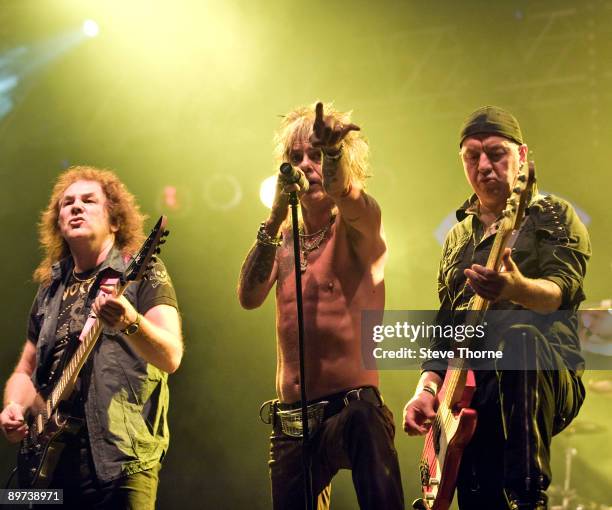 Graham Oliver, John Ward and Steve Dawson of Oliver/Dawson Saxon perform on stage on the second day of the Bulldog Bash festival at Avon Park Raceway...