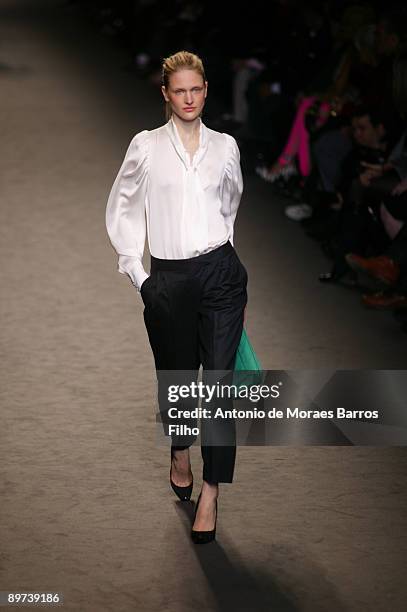 Model walks the runway at the Stella McCartney Ready-to-Wear A/W 2009 fashion show during Paris Fashion Week at Carreau du Temple on March 9, 2009 in...