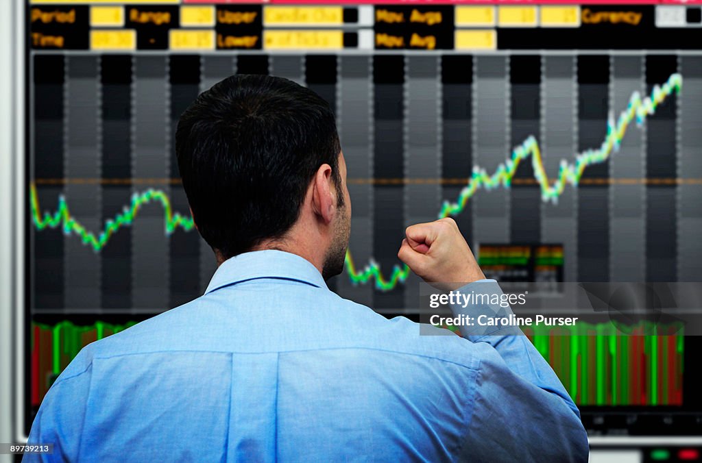 Trader watching stocks go up