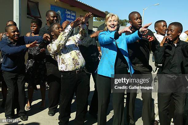 Secretary of State Hillary Clinton pays a visit to the Victoria Mxenge housing project in Gugulethu on August 8, 2009 in Cape Town, South Africa....