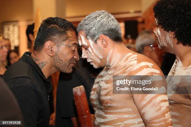 Jarred Fogarty of the Yugambeh clan is given a traditonal hongi after the Queens Baton presentation at Auckland War Memorial Museum during the...