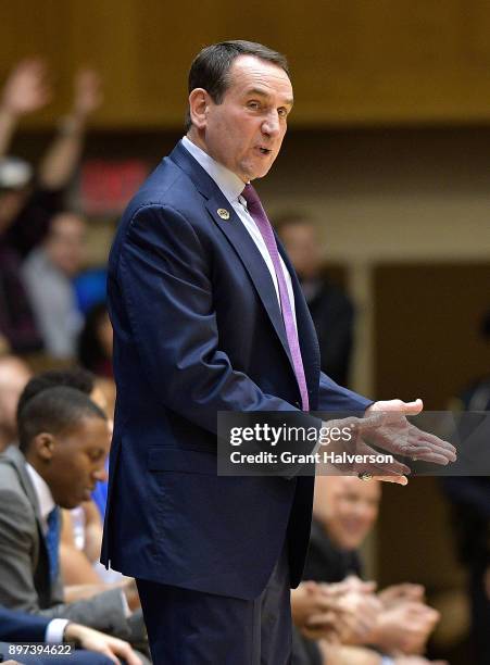 Head coach Mike Krzyzewski of the Duke Blue Devils directs his team against the Evansville Aces during their game at Cameron Indoor Stadium on...