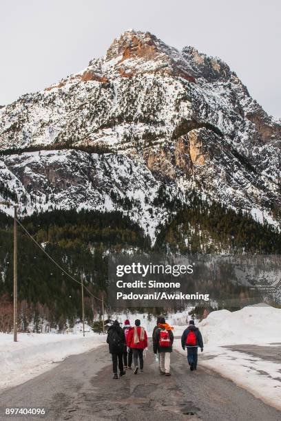 Migrants walk to reach Colle della Scala during another attempt to reach the French border on December 22, 2017 in Bardonecchia, Turin, Italy. After...