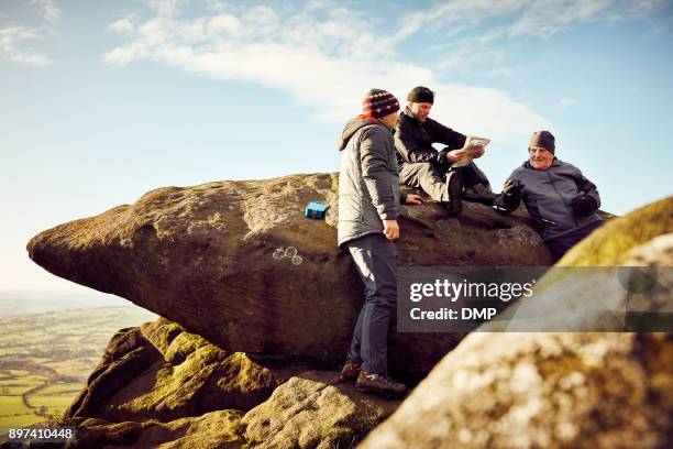 Hikers resting while trekking in the mountains