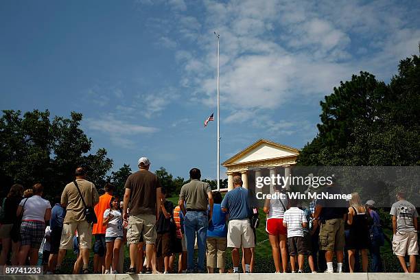 Crowds visit the gravesite of U.S. President John F. Kennedy at Arlington National Cemetery August 11, 2009 in Arlington, Virginia. President...
