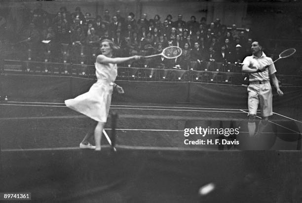 British badminton player Betty Uber in action during the All-England Badminton Championships at the Royal Horticultural Hall, London, 9th March 1934.