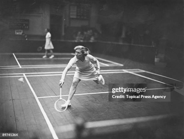 British badminton player Betty Uber competing in the Women's Singles at the All-England Badminton Championships at the Royal Horticultural Hall,...