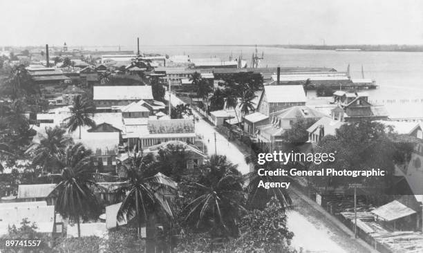 View over the city of Georgetown, Guyana, with the mouth of the Demerara River, circa 1935.